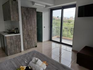 מטבח או מטבחון ב-Luana Monte Apartments