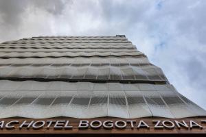 a close up of the facade of a hotel boogota zoo at AC Hotel by Marriott Bogota Zona T in Bogotá