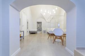 Letto o letti in una camera di Palazzo Junno Dimora D'Epoca