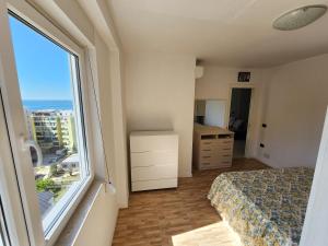 Ένα ή περισσότερα κρεβάτια σε δωμάτιο στο Apartments near the Sea in Shengjin