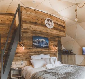 Postel nebo postele na pokoji v ubytování Alpin D'Hôme Hôtel & Spa