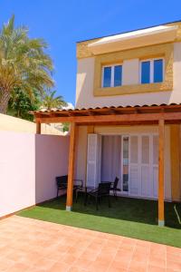 a view of a house with a patio at Casa del sol 2 bedrooms in Morro del Jable