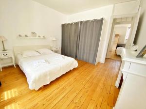 Posteľ alebo postele v izbe v ubytovaní Appt. T3 type Haussmannien vue mer sur port