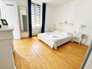 Posteľ alebo postele v izbe v ubytovaní Appt. T3 type Haussmannien vue mer sur port