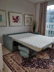 a mattress on top of a bed in a room at Studio Lumilinna in Tampere