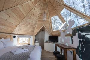 TV a/nebo společenská místnost v ubytování Alpin D'Hôme Hôtel & Spa