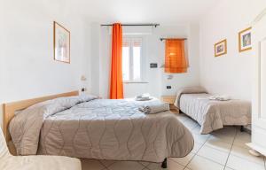 Postel nebo postele na pokoji v ubytování Hotel Paolina