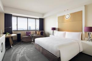 Postel nebo postele na pokoji v ubytování Tokyo Marriott Hotel