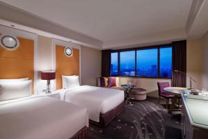 Tempat tidur dalam kamar di Tokyo Marriott Hotel