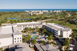 an aerial view of the resort with the ocean in the background at Marriott Hutchinson Island Beach Resort, Golf & Marina in Stuart