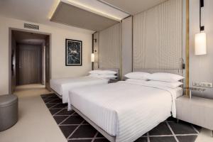 Ένα ή περισσότερα κρεβάτια σε δωμάτιο στο Rabat Marriott Hotel