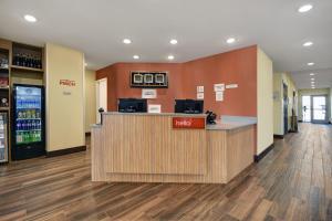 a lobby of a store with a reception counter at TownePlace Suites by Marriott Grand Rapids Wyoming in Wyoming
