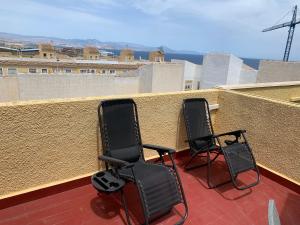 Zdjęcie z galerii obiektu Adosado tranquilo con piscina y vistas al mar w mieście Puerto Marino