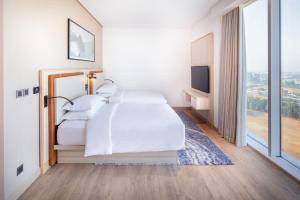Voodi või voodid majutusasutuse Four Points by Sheraton Jeddah Corniche toas