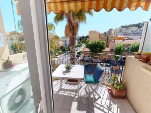 Balkón alebo terasa v ubytovaní Studio climatisé avec terrasse ensoleillée, proche plages et centre, Menton - FR-1-196-314