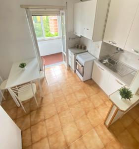 Η κουζίνα ή μικρή κουζίνα στο Casa Relax con Parcheggio e Metro