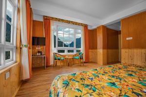Summit Gangchen Hotel客房内的一张或多张床位