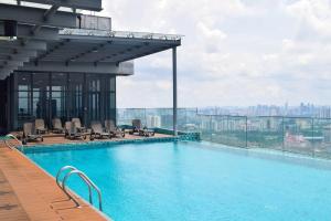 a swimming pool on the top of a building at EkoCheras Loft 5 pax, #Snooker #AboveMall #Balcony #FreeCarPark in Kuala Lumpur