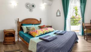 Un pat sau paturi într-o cameră la City Dacha - Ocean