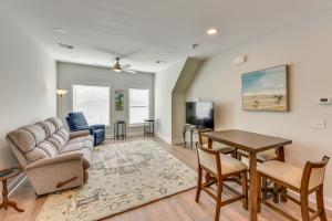 a living room with a couch and a table at Bluffton Vacation Rental - 4 Mi to Tanger Outlets! in Bluffton