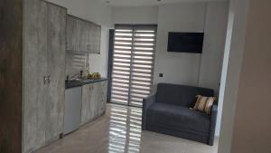 מטבח או מטבחון ב-Luana Monte Apartments
