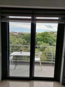 מרפסת או טרסה ב-Luana Monte Apartments