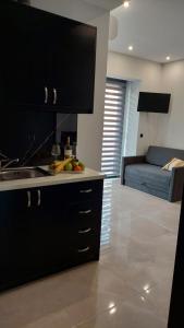מטבח או מטבחון ב-Luana Monte Apartments
