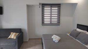 אזור ישיבה ב-Luana Monte Apartments