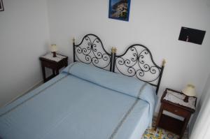 Postel nebo postele na pokoji v ubytování Casa Fortunata