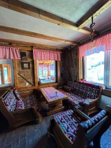 Posezení v ubytování Bed and Breakfast Umoljani