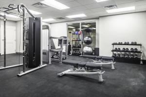 a gym with two treadmills and two machines at TownePlace Suites by Marriott San Antonio Universal City, Live Oak in Selma