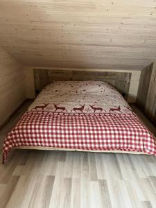 Łóżko lub łóżka w pokoju w obiekcie Chalet L'Ôbresse
