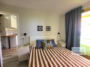 Postel nebo postele na pokoji v ubytování Ático Novelty Confort + 23 fotografií