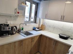 A kitchen or kitchenette at Marlen House Chania
