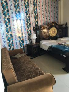 Postel nebo postele na pokoji v ubytování Three Star Hotel & Restaurent Malam jabba swat + 26 fotografií