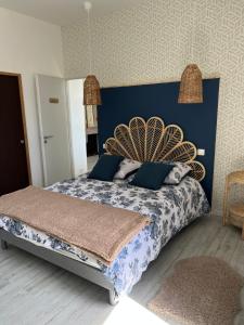 Łóżko lub łóżka w pokoju w obiekcie Détente et vue exceptionnelle à L'appart' de Charles