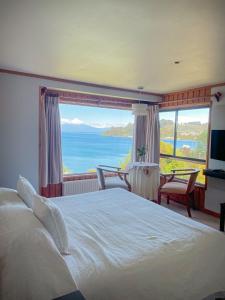 Postel nebo postele na pokoji v ubytování Hotel Elun, la mejor vista