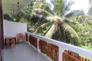 Balkón nebo terasa v ubytování CoCoSuRf House, Luxury among palms