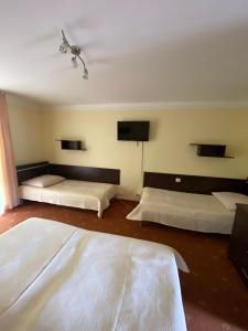 Letto o letti in una camera di OW Posejdon