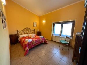 Posteľ alebo postele v izbe v ubytovaní Villa Matilde