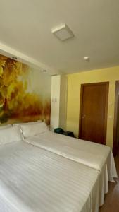 Postel nebo postele na pokoji v ubytování The Way Hotel Molinaseca