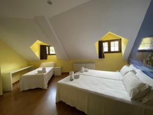 Postel nebo postele na pokoji v ubytování The Way Hotel Molinaseca
