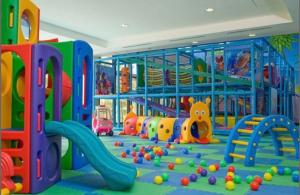 a play room with a bunch of toys in it at Pico de Loro Miranda Family Beach Condo max 6 pax with fiber internet in Nasugbu