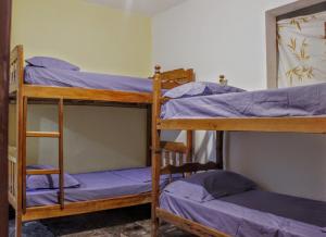 Buena Vibe Hostel客房内的一张或多张床位