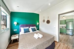Postel nebo postele na pokoji v ubytování Ionian Citizen Penthouse