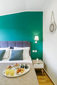 Postel nebo postele na pokoji v ubytování Ionian Citizen Penthouse