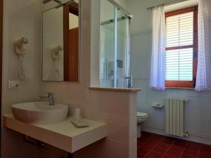 Koupelna v ubytování Kleade B&B