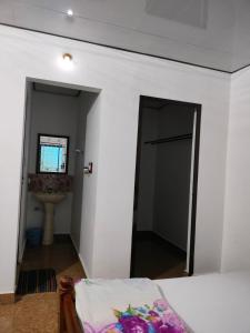 REST POINT HOMESTAY客房内的一张或多张床位