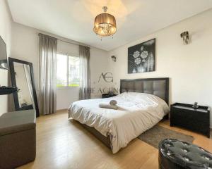 Ένα ή περισσότερα κρεβάτια σε δωμάτιο στο Appartement luxueux bay view