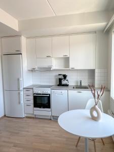 Η κουζίνα ή μικρή κουζίνα στο Studio Apartment Station +4 φωτογραφίες